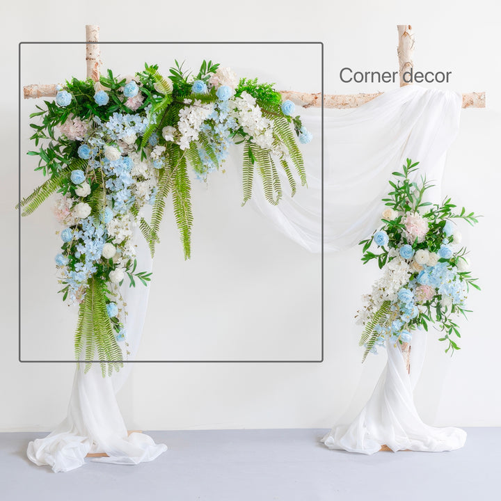 Pastel Blue & White Wedding Arch Decor With Hanging Greenery