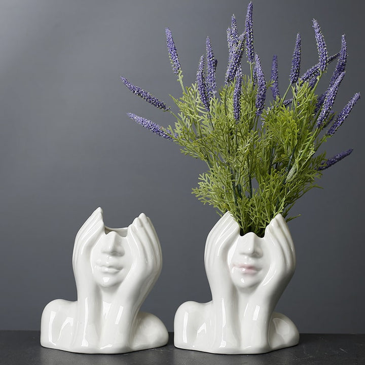 Modern art-inspired white ceramic portrait vase