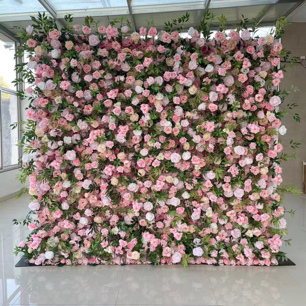 Romantic blush pink and greenery flower wall backdrop for weddings.
