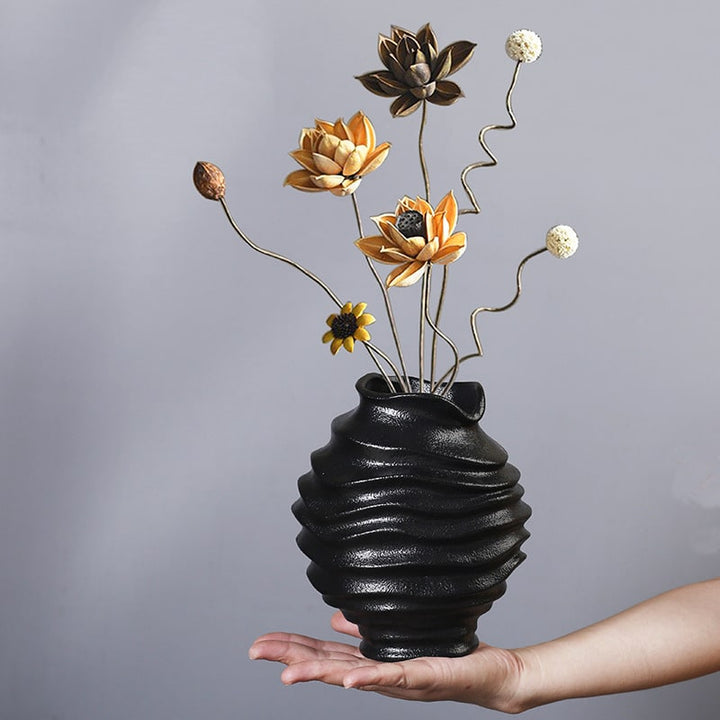 White polyhedron ceramic vase on display