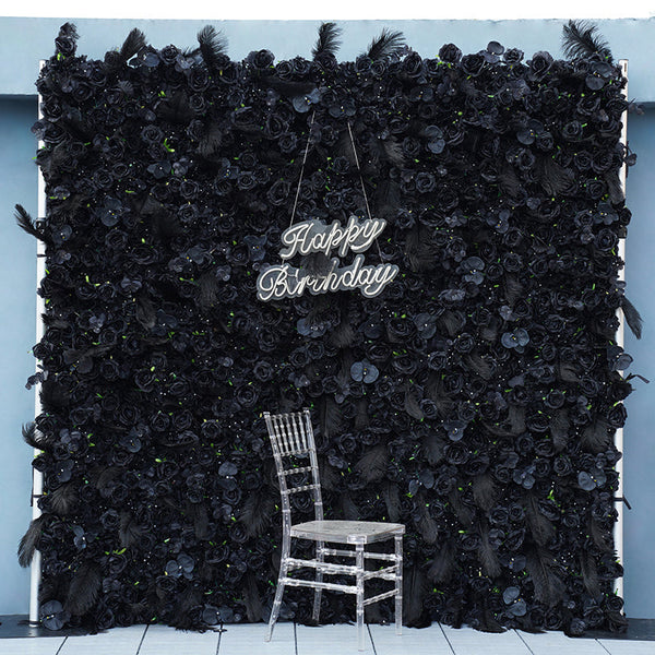 Elegant black flower wall backdrop adding luxury to events.
