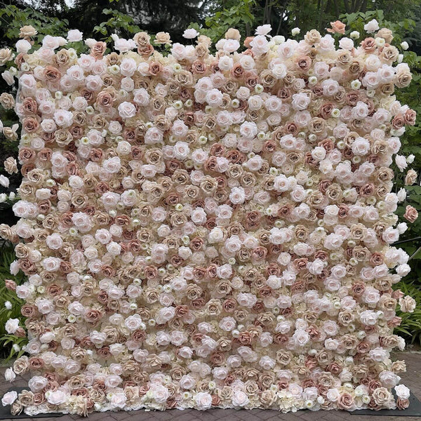 Champagne and blush floral wall backdrop with soft ivory roses.
