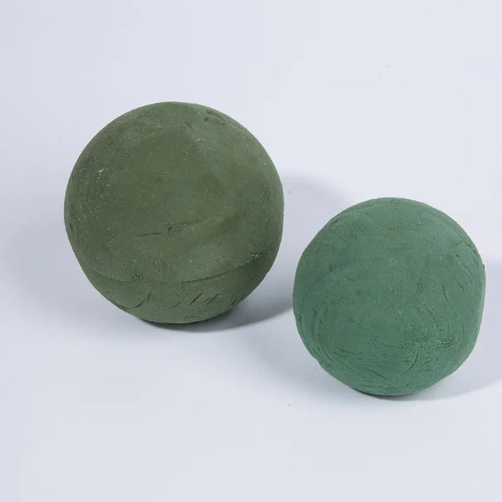 Wet Green Floral Foam Balls Pack 2 is an ideal addition to your flower foam collection.