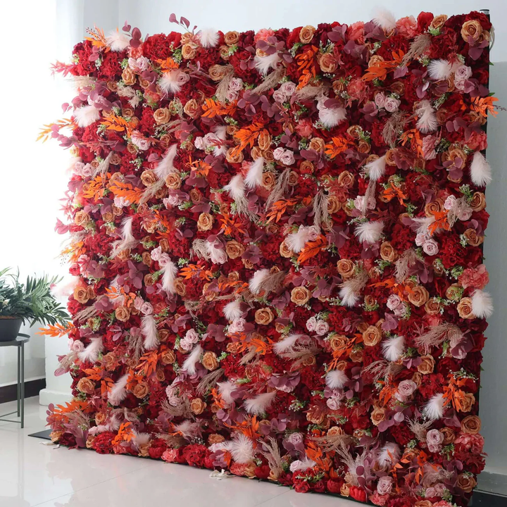 Lush floral wall with autumn-inspired colors and textures, perfect for event decor.