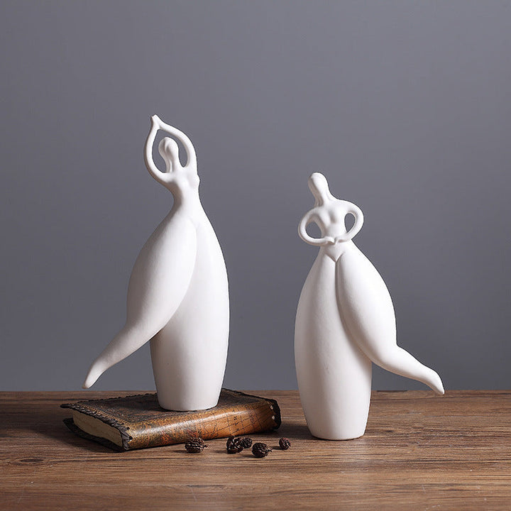 Set of five artistic dancer figurines in minimalist style