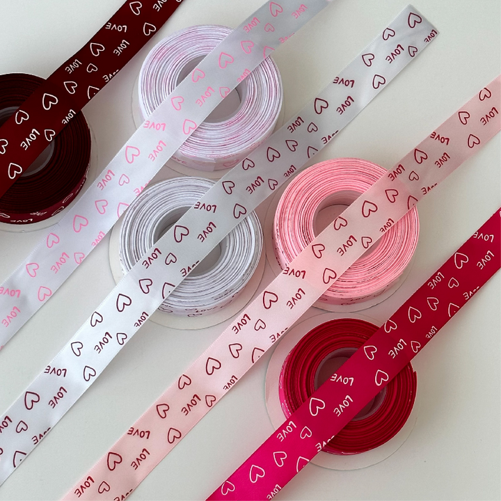 LOVE Heart Satin Ribbon(25mmx20Yd) is a delightful addition to your valentine flowers collection.