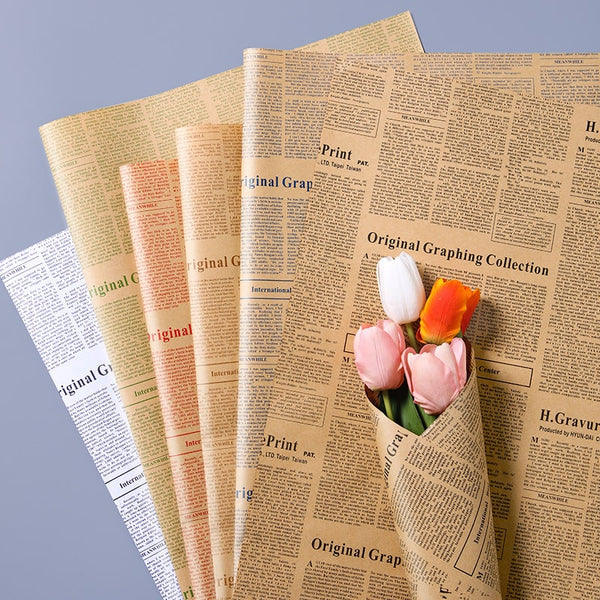 Close-up of retro kraft flower wrapping paper with newspaper print