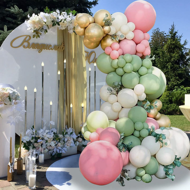 Baby shower balloon arch with pastel accents
