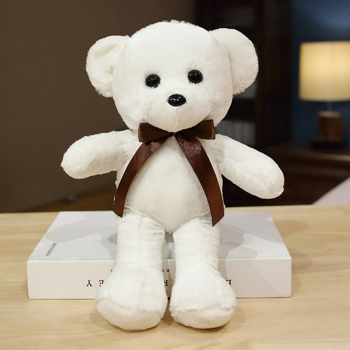 Cuddly Teddy Bear Soft Plush Toy is a delightful addition to your valentine flower collection.