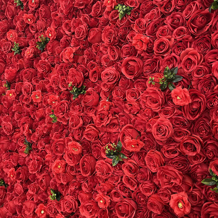 Lush red rose flower wall backdrop for weddings and events
