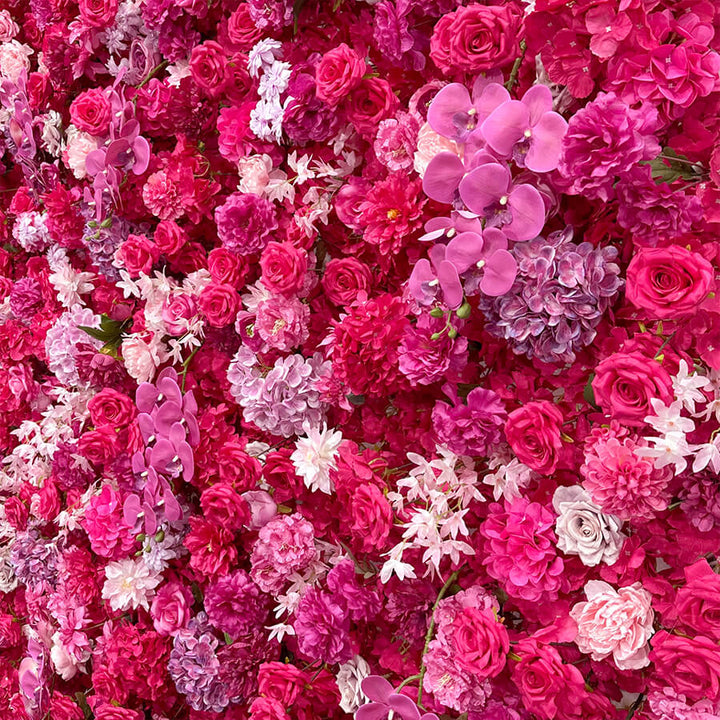 Bold floral backdrop featuring hot pink, blush, and lavender flowers.
