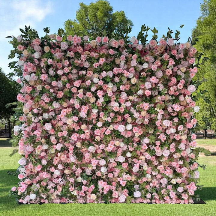 Romantic blush pink and greenery flower wall backdrop for weddings.
