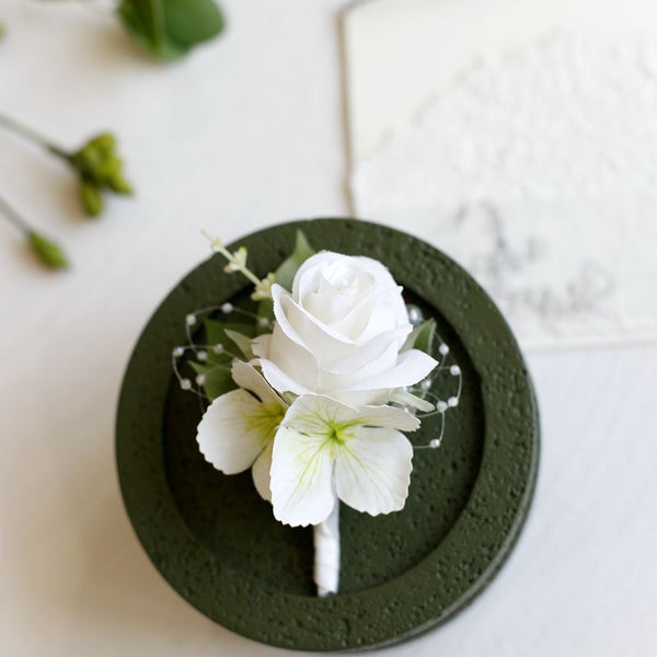 Elegant Rose and Hydrangea Wedding Boutonniere In White, Dusty Pink & Red