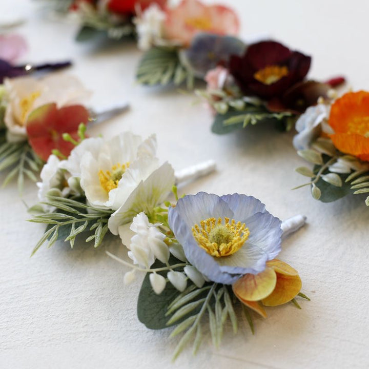 Vibrant Anemone Boutonniere Collection