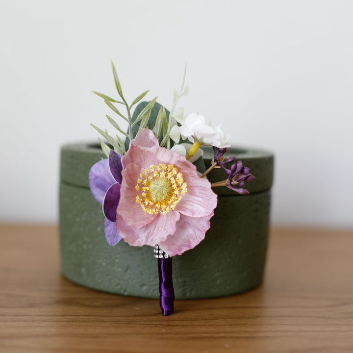 Vibrant Anemone Boutonniere Collection