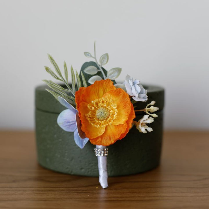 Vibrant Anemone Boutonniere Collection