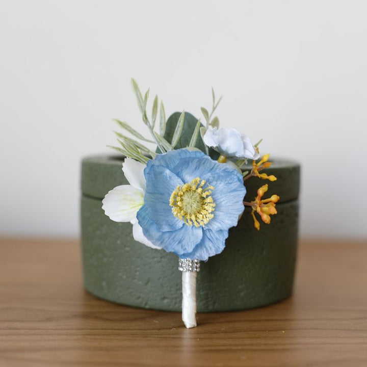 Vibrant Anemone Boutonniere Collection