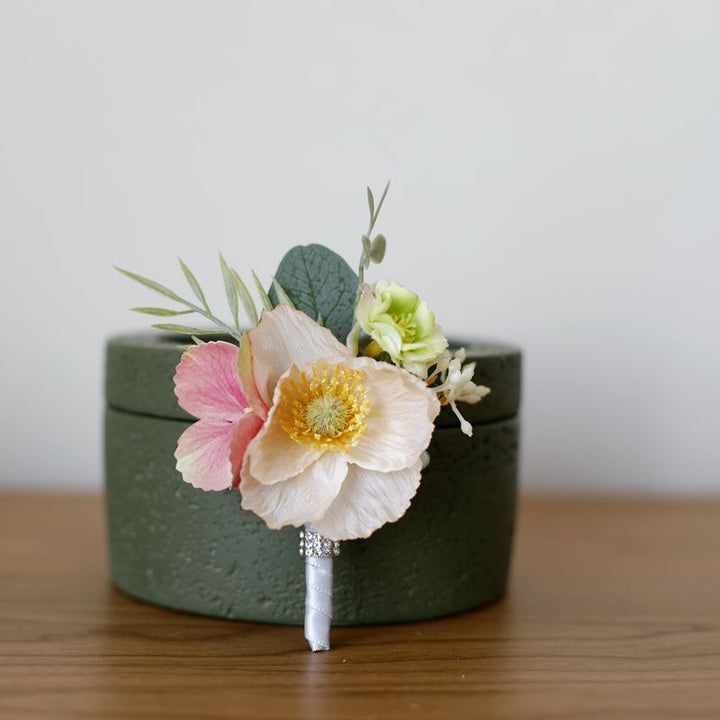 Vibrant Anemone Boutonniere Collection