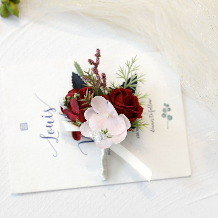 deep red Rose and Hydrangea Boutonniere Collection