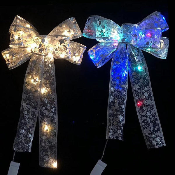 LED Christmas Gift Bow Front Door Decoration is a wonderful addition to your christmas arrangements collection.