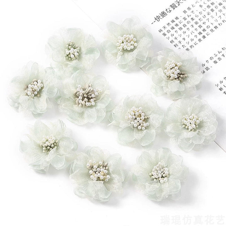 4cm Organza Fabric Flower Heads Pack 30 is a perfect addition to your florist supplies collection.