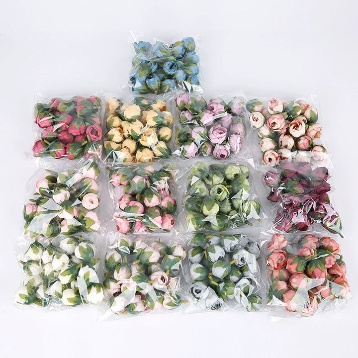 2cm Vintage Rose Buds Silk Flower Heads Pack 40 is a perfect addition to your florist supplies collection.