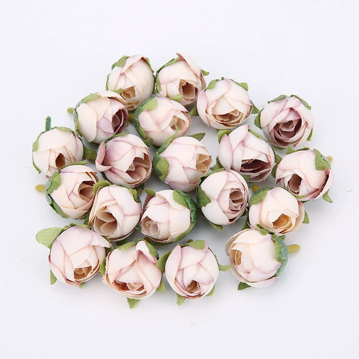 2cm Vintage Rose Buds Silk Flower Heads Pack 40 is a perfect addition to your decorative floral collection.