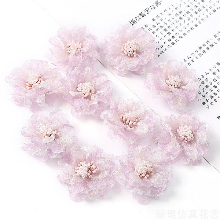 4cm Organza Fabric Flower Heads Pack 30 is a perfect addition to your decorative floral collection.