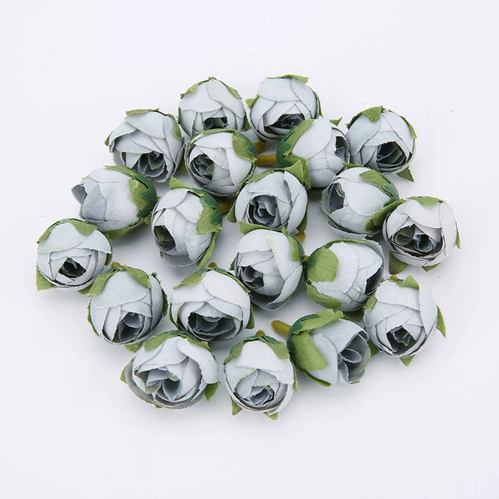 2cm Vintage Rose Buds Silk Flower Heads Pack 40 is a perfect addition to your floral supply collection.