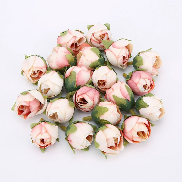 2cm Vintage Rose Buds Silk Flower Heads Pack 40 is a perfect addition to your florist supply collection.