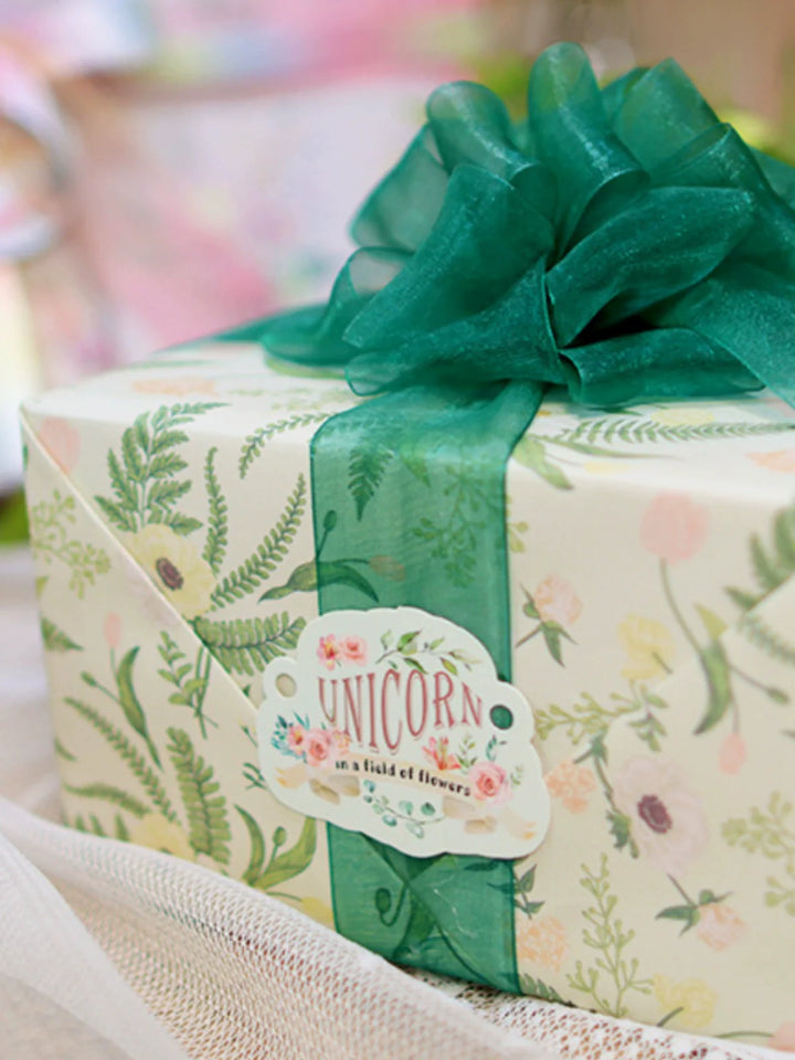 Soft pastel floral paper ideal for wrapping gifts and bouquets.