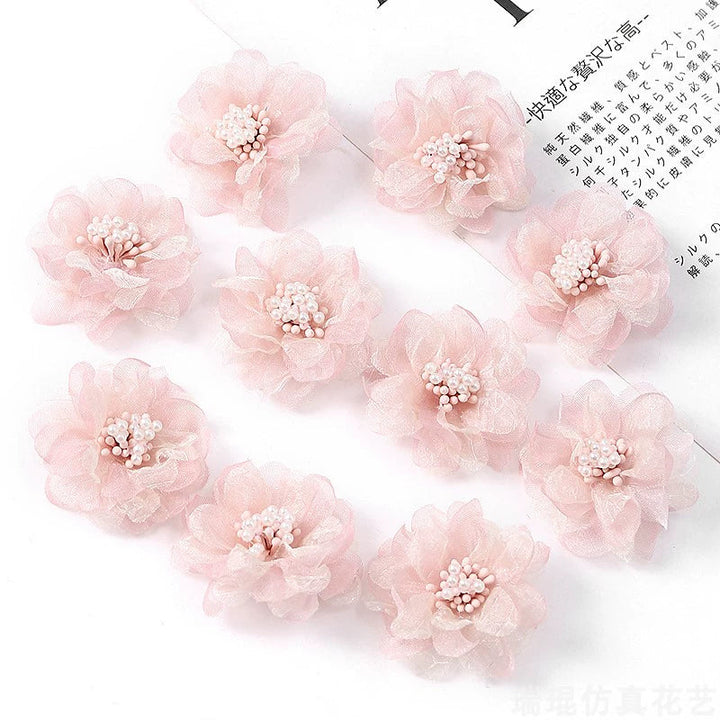 4cm Organza Fabric Flower Heads Pack 30 is a perfect addition to your florist supplies collection.