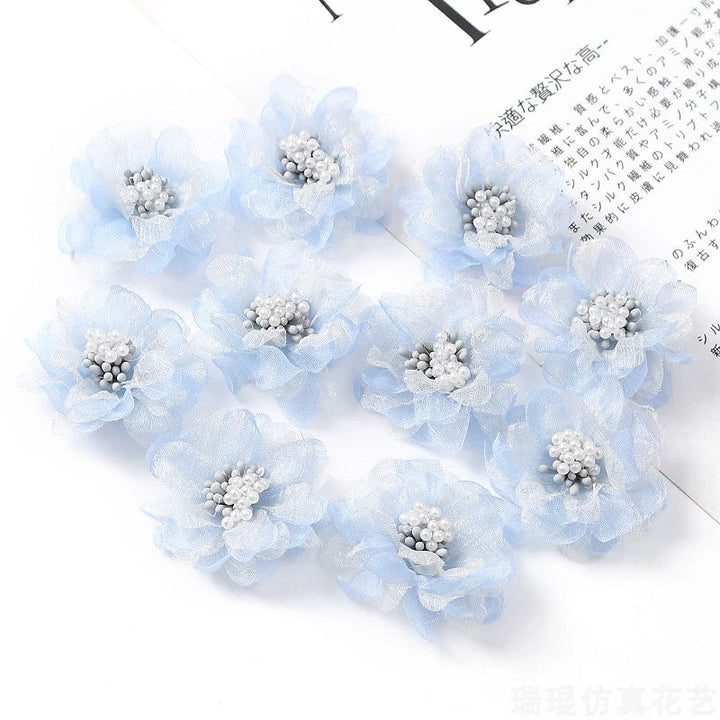 4cm Organza Fabric Flower Heads Pack 30 is a perfect addition to your decorative floral collection.