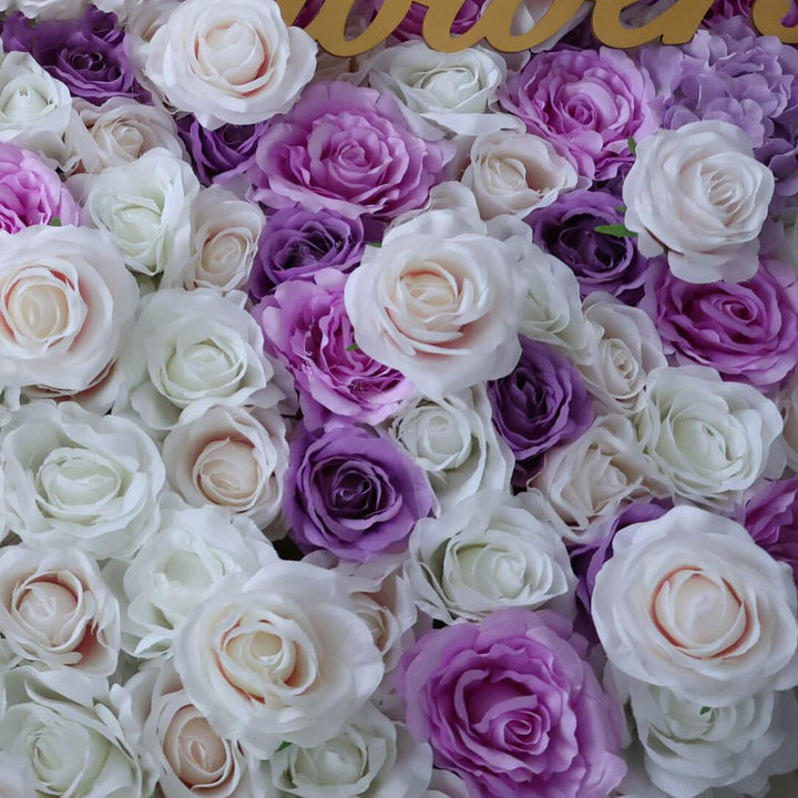 Elegant purple-to-white flower wall for wedding and event decor.
