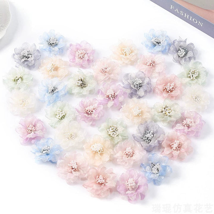 4cm Organza Fabric Flower Heads Pack 30 is a perfect addition to your floral supplies collection.