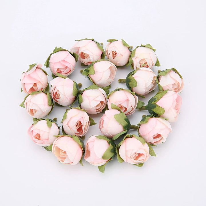 2cm Vintage Rose Buds Silk Flower Heads Pack 40 is a perfect addition to your floral supplies collection.