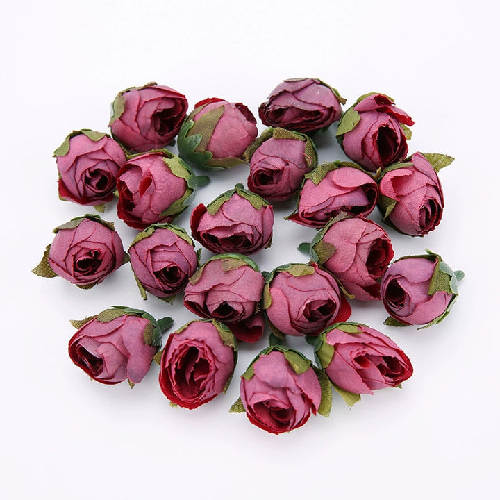 2cm Vintage Rose Buds Silk Flower Heads Pack 40 is a perfect addition to your floral supplies collection.