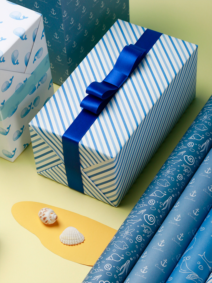 Blue whale print wrapping paper in premium quality.