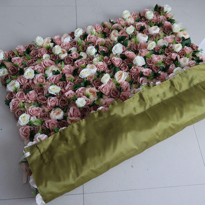 Classic floral arrangement with brown and cream roses on a decorative flower wall.
