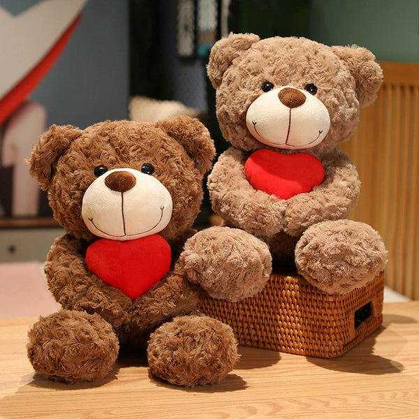 Teddy Bear Embracing Red Heart 45cm is a delightful addition to your valentine flower collection.