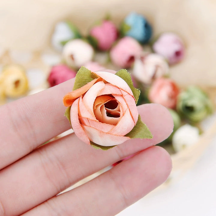 2cm Vintage Rose Buds Silk Flower Heads Pack 40 is a perfect addition to your florist supply collection.