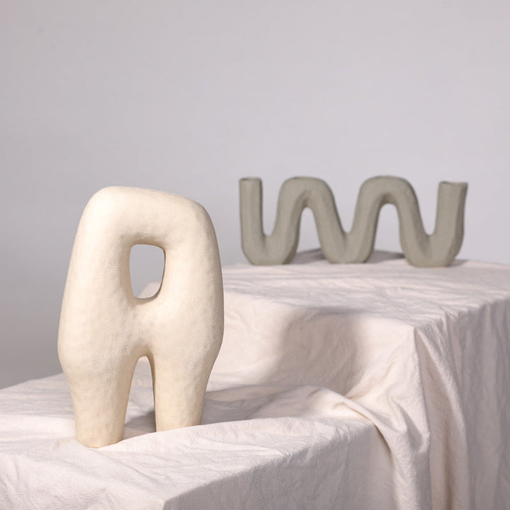 Creative ceramic abstract sculptures in earth tones