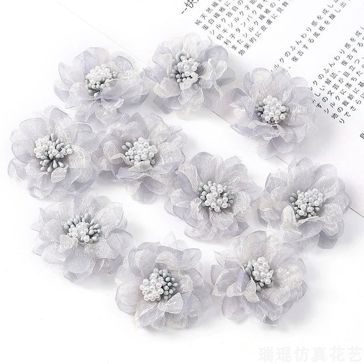 4cm Organza Fabric Flower Heads Pack 30 is a perfect addition to your florist supplies collection.