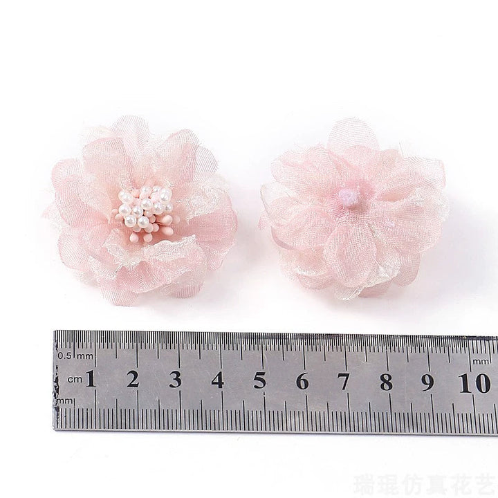 4cm Organza Fabric Flower Heads Pack 30 is a perfect addition to your florist supplies collection.