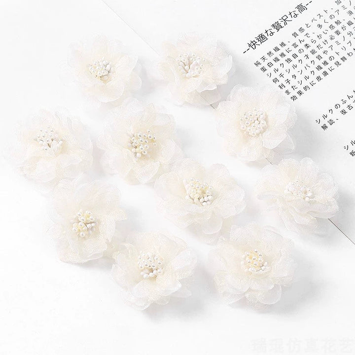 4cm Organza Fabric Flower Heads Pack 30 is a perfect addition to your florist supplies collection.