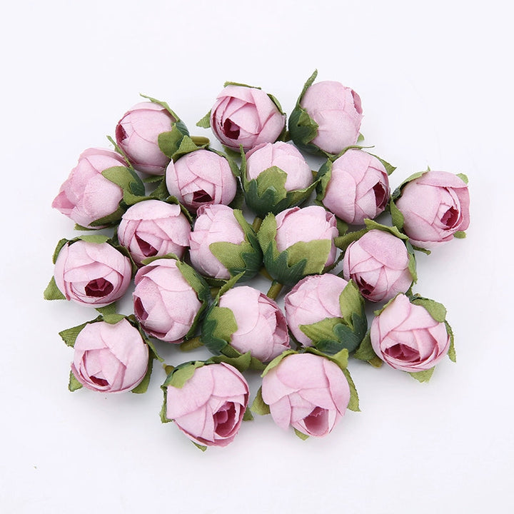 2cm Vintage Rose Buds Silk Flower Heads Pack 40 is a perfect addition to your decorative floral collection.