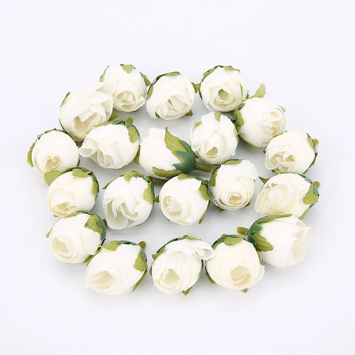 2cm Vintage Rose Buds Silk Flower Heads Pack 40 is a perfect addition to your decorative floral collection.