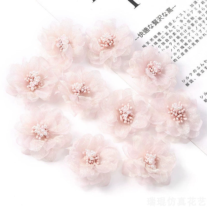 4cm Organza Fabric Flower Heads Pack 30 is a perfect addition to your decorative floral collection.