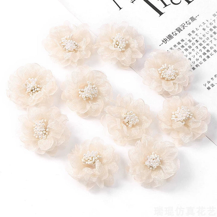 4cm Organza Fabric Flower Heads Pack 30 is a perfect addition to your florist supplies collection.