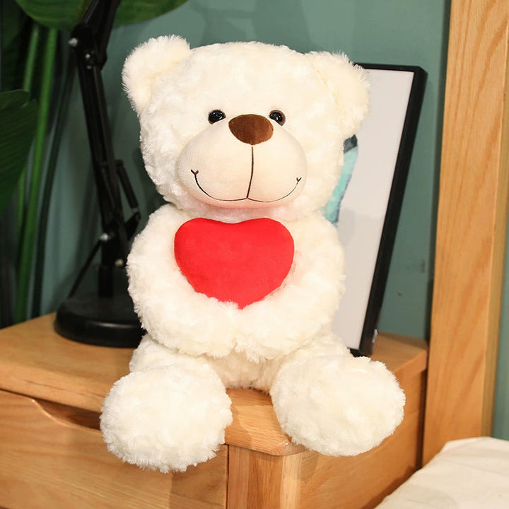 Teddy Bear Embracing Red Heart 45cm is a delightful addition to your valentine's day bouquets collection.